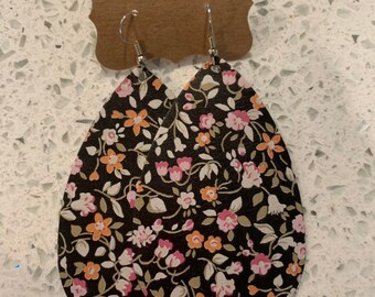 Pink and orange floral on black leather teardrop earrings