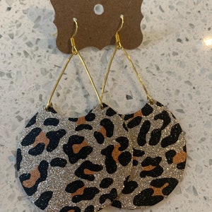 Glitter leopard circle moon cut outs with a triangular drop earrings