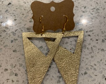 Gold triangle cut out leather earrings