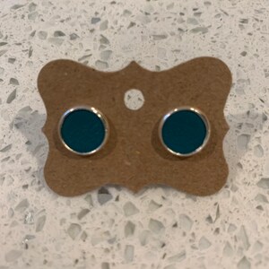 Turquoise leather stud earrings set in silver
