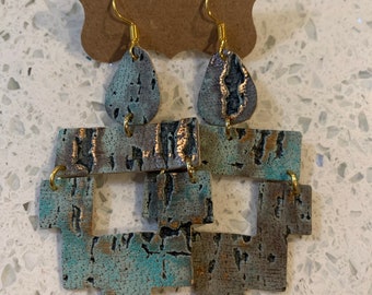 Turquoise driftwood tribal cut out leather earrings