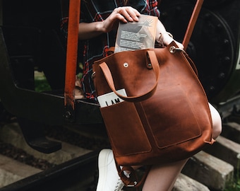 Large cognac leather tote bag for women with outside pockets zipper and custom inside section for laptop