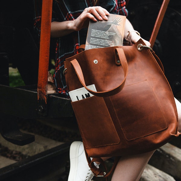 Large cognac leather tote bag for women with outside pockets zipper and custom inside section for laptop