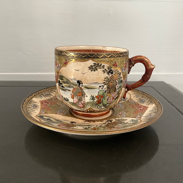 Antique Satsuma Shuzan cup and saucer with staples restoration