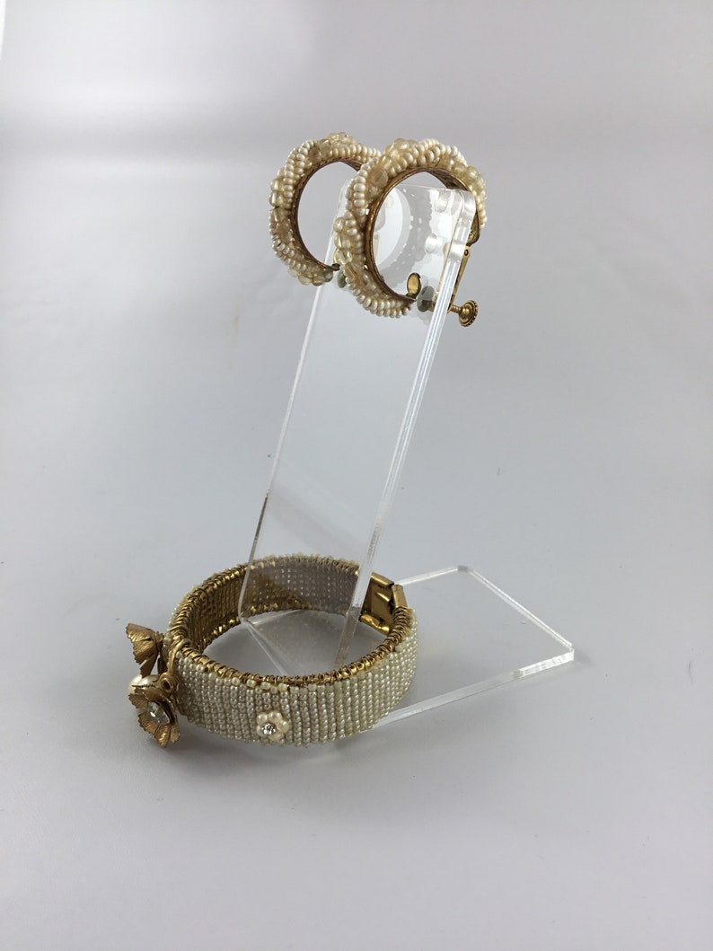 Miriam Haskell not signed vintage bracelet and earrings .