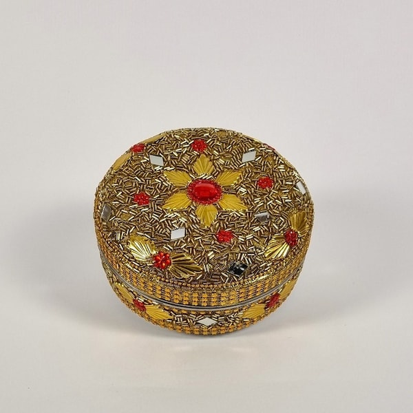 Indian decorated chapati box with gold colored beads and mirrorwork
