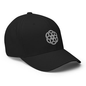 May include: A black baseball cap with a white embroidered geometric design on the front.