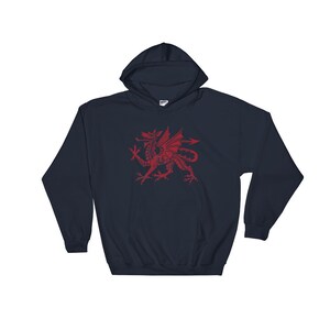 May include: A navy blue hooded sweatshirt with a red dragon graphic on the front. The dragon is a stylized version of the Welsh dragon.