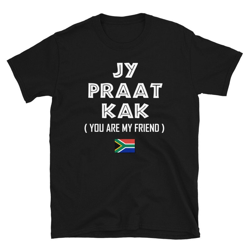 May include: Black t-shirt with white text that reads "Jy Praat Kak (You Are My Friend)" and a South African flag.