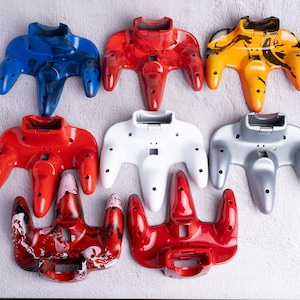 VENTA AL POR MAYOR - Carcasas inferiores para N64 - Carcasas inferiores pintadas a medida para mandos oficiales de Nintendo 64