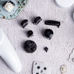 Conjunto de botões pretos para controle de GameCube (ABXY, Start, D-Pad e Z)