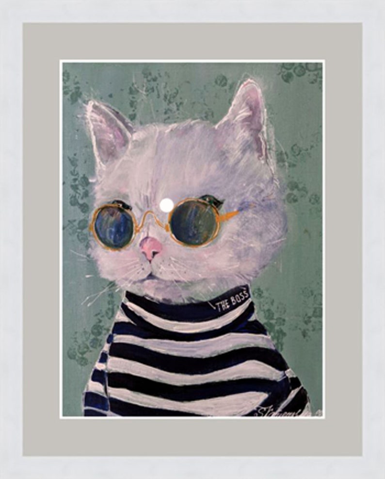 May include: A white cat wearing round, gold-rimmed sunglasses and a black and white striped sweater with the text "The Boss" on the collar. The cat is against a green background with a floral pattern.