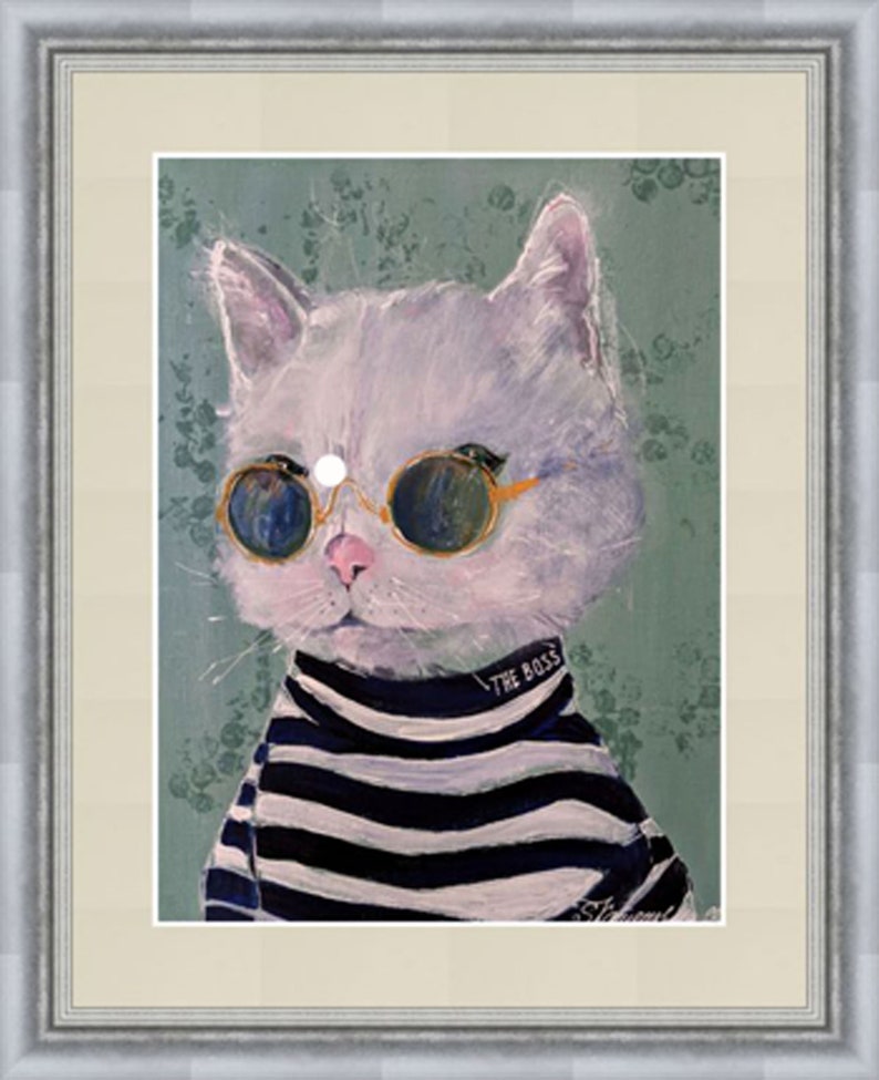 May include: A white cat wearing round sunglasses and a black and white striped sweater with the text "The Boss" on the collar. The cat is against a green background with a floral pattern.