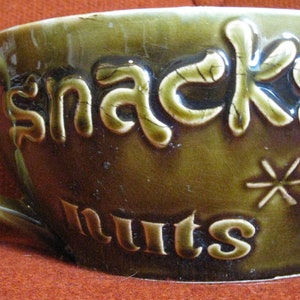 Large mid century modern olive green dripware snack bowl shaped like a tea cup