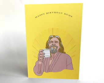 May include: Yellow birthday card with the text "HAPPY BIRTHDAY DUDE" at the top. The card features an illustration of a man in a robe holding a drink. The background has a yellow burst design.