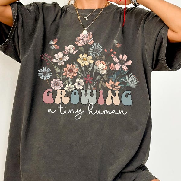Comfort Colors® Growing A Tiny Human Shirt, Wildflowers Pregnancy Shirt, Pregnancy Announcement Shirt For Mom-To-Be Gift, Maternity T-Shirt