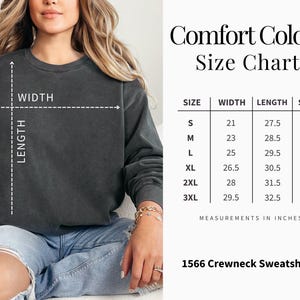 May include: A dark grey crew neck sweatshirt with a size chart. The chart lists sizes S to 3XL, with measurements in inches for width, length, and sleeve length. The text "Comfort Colors Size Chart" is at the top.
