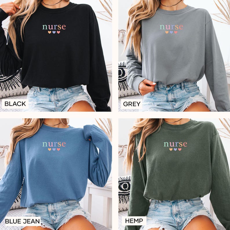 May include: Four long-sleeved shirts in black, grey, blue jean, and hemp colors. Each shirt has the word "nurse" embroidered in pastel colors above three hearts. The shirts are made of a soft material.