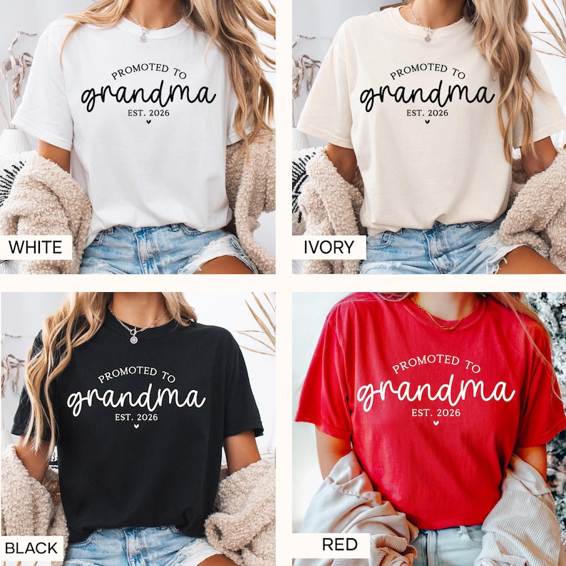 May include: Four t-shirts in white, ivory, black, and red, each with the text "PROMOTED TO grandma EST. 2026" in a cursive font. The shirts are displayed on a person.