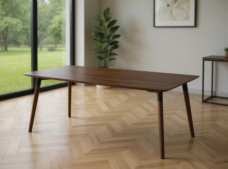 Tapered solid oak table legs - Modern angular joinery - Hand-finished smooth edges - Shows craftsmanship quality
