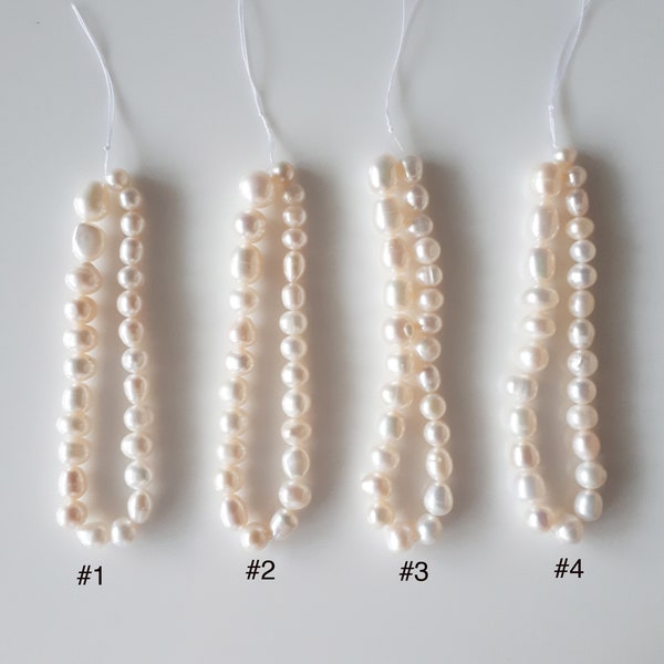 26 pearls, Genuine freshwater pearl, white / ivory colour, drilled through hole loose pearls,  normal natural texture on pearls.