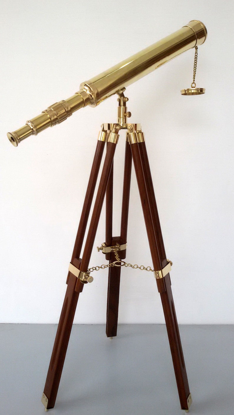 Telescopio antico in ottone blu marino con supporto per treppiede in