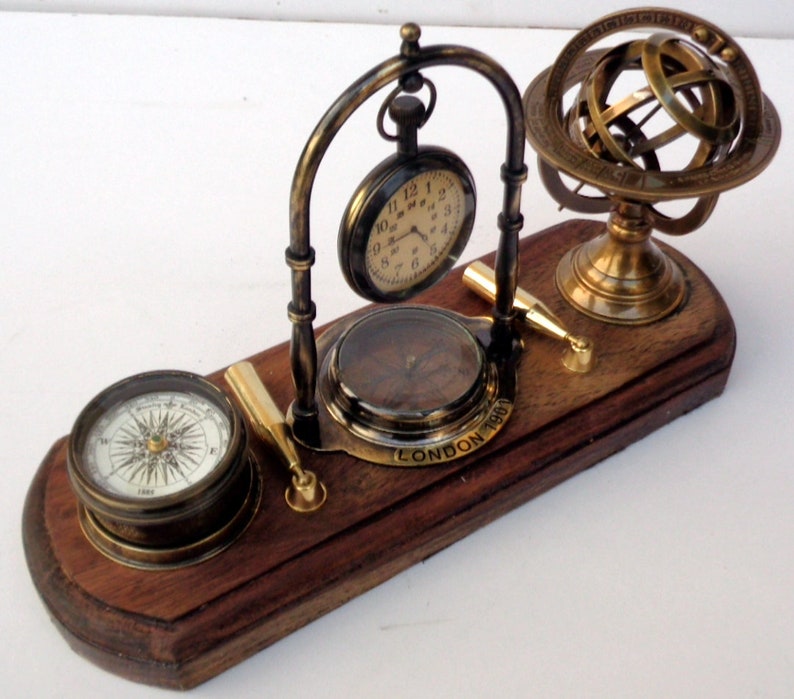 Antique brass table top clock with pen holder compass armillary sphere globe clock desk top wooden base image 9