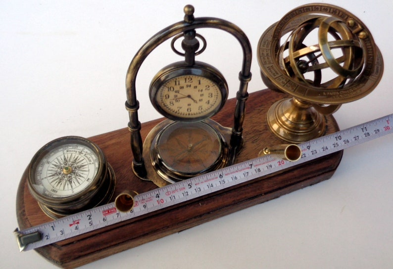 Antique brass table top clock with pen holder compass armillary sphere globe clock desk top wooden base image 5