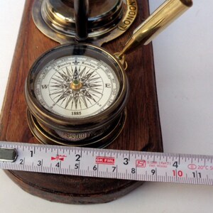 Antique brass table top clock with pen holder compass armillary sphere globe clock desk top wooden base image 8