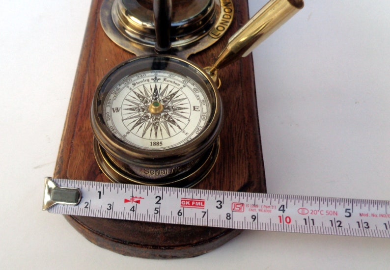 Antique brass table top clock with pen holder compass armillary sphere globe clock desk top wooden base image 8