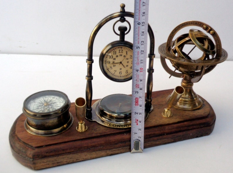 Antique brass table top clock with pen holder compass armillary sphere globe clock desk top wooden base image 6