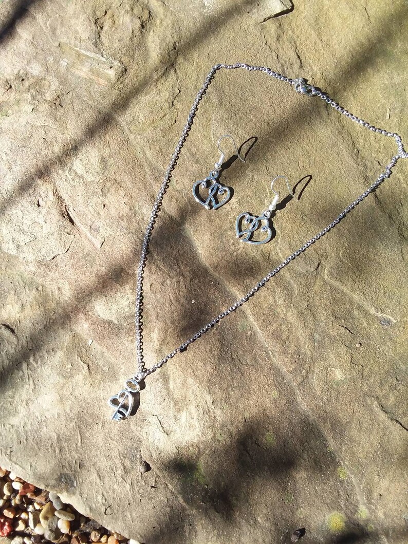 Dubble heart earrings and heart in key charm necklace silver