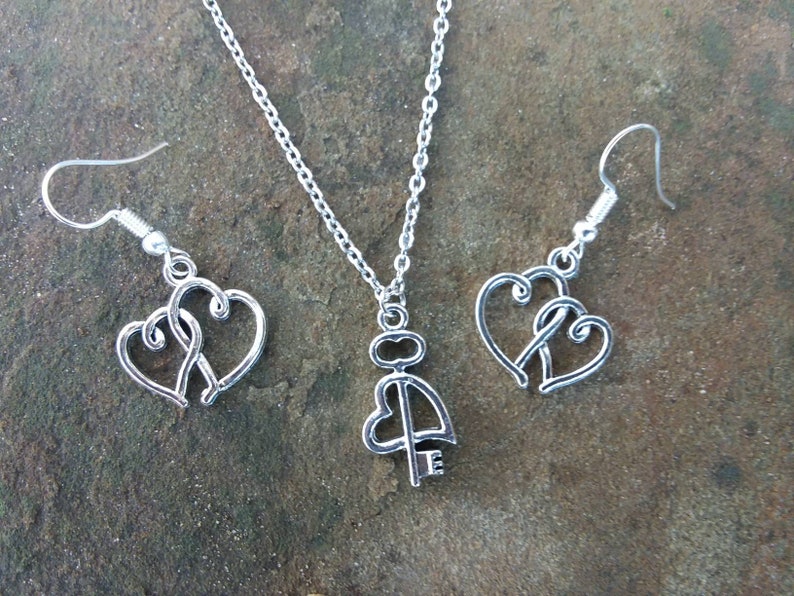 Dubble heart earrings and heart in key charm necklace silver