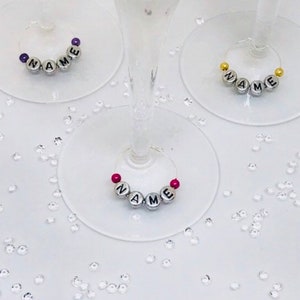 Name wine glass charms with coloured beads. Personalised gift or party favour.