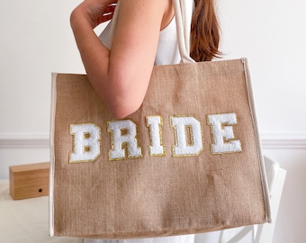 Bride tote bag with gold trim white letters / Bridal shower engagement gift / Bride to be Mrs Wedding / Hen party Honeymoon jute beach bag