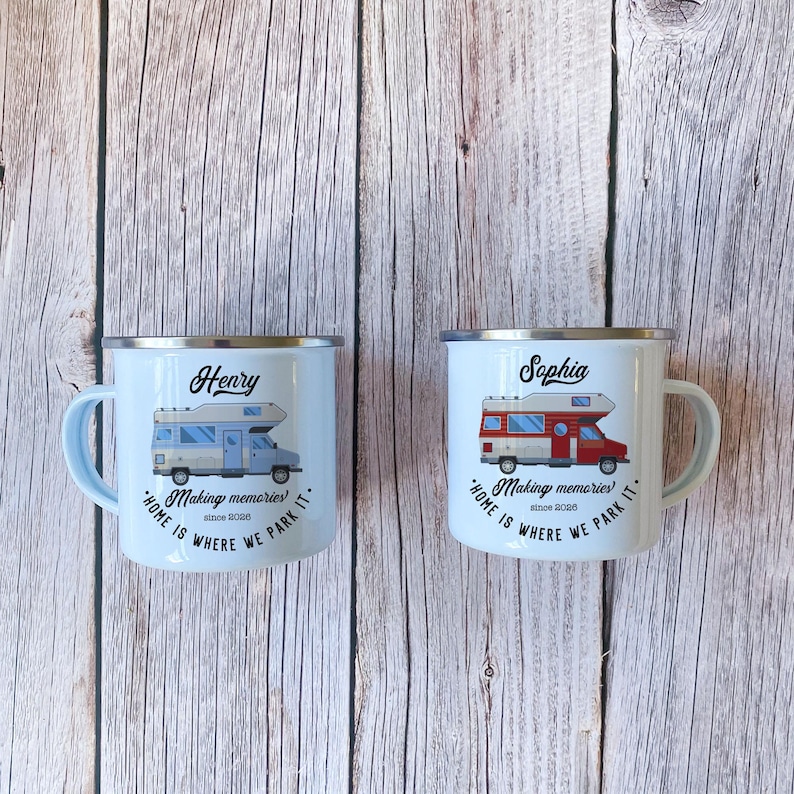 May include: Two light blue enamel mugs with silver rims and handles. Each mug features a camper illustration and the text "Making memories since 2020". One mug says "Henry" and the other says "Sophia".