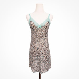 Mini abito babydoll in pizzo turchese con stampa leopardata Y2K anni 2000