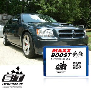 May include: A blue and red performance chip with the text "MAXX BOOST Performance Chip" and a checkered flag graphic. The chip also features a QR code and the text "ST SawyerTuning.com Trusted Performance 2 Kings 6:17".