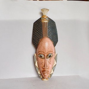 A Lovely Vintage, Tribal, Hand carved, Guro Tribal Mask, featuring Pink + Pastel Pigments Wall decor from Ivory Coast, Cote d&#39;Ivoire, Africa