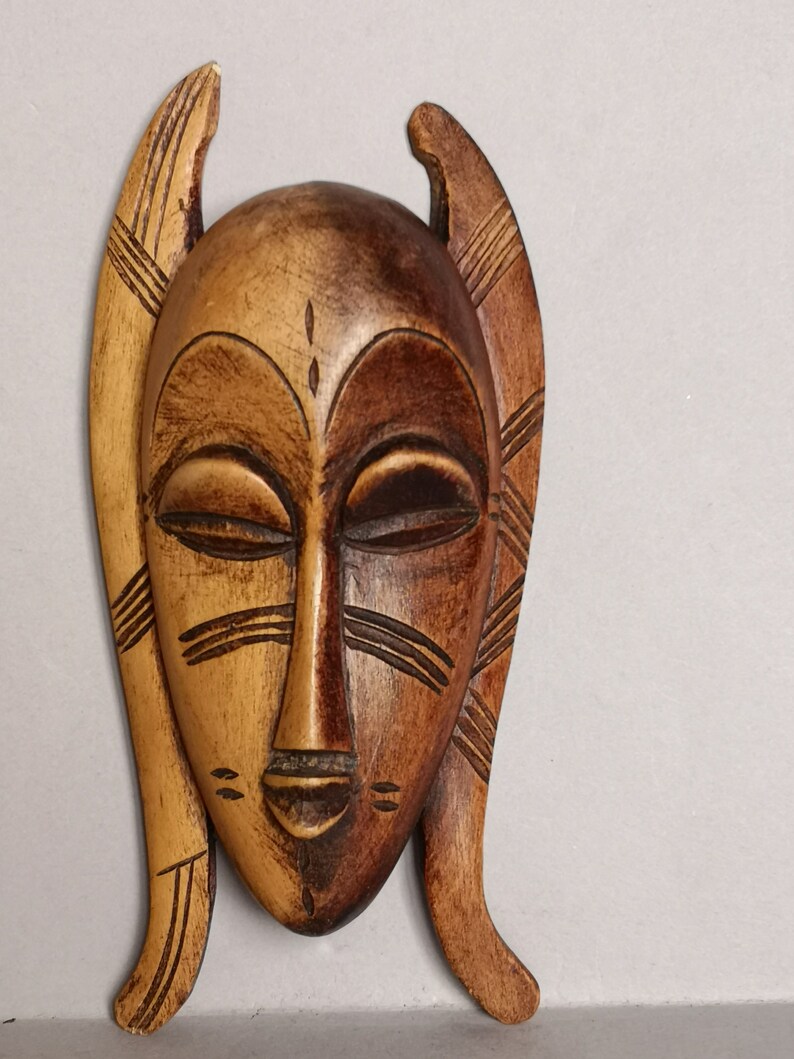 possibly from Ivory Coast Cote d/'Ivoire and found in France A Lovely decorative Hand carved Small Tribal Passport type Mask