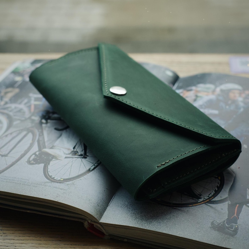 womens wallet
leather pocketbook
long wallet big
button wallet
simple elegant purse
handmade leather
bright green wallet
emerald wallet
green leather wallet
deep green wallet
green leather purse
dark green leather
cute girls wallet