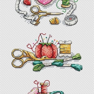May include: A cross-stitch illustration of sewing and embroidery tools. The image includes scissors, thread, needles, a pincushion, measuring tape, and a yarn ball. The color palette features pink, green, yellow, and gold.