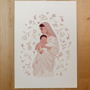 May include: A digital illustration of a woman holding a baby and a lamb. The woman is wearing a white robe and a veil. The baby is wrapped in a white blanket. The lamb is white with brown markings. The background is a light pink with a floral pattern.