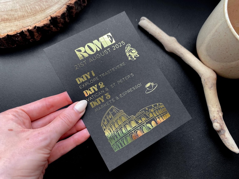 May include: Black card with gold foil text reading "ROME 21ST AUGUST 2025." It lists a 3-day itinerary: Explore Trastevere, Vatican & St. Peter's, and Markets & Espresso. Includes icons of a helmet, coffee cup, and the Colosseum.