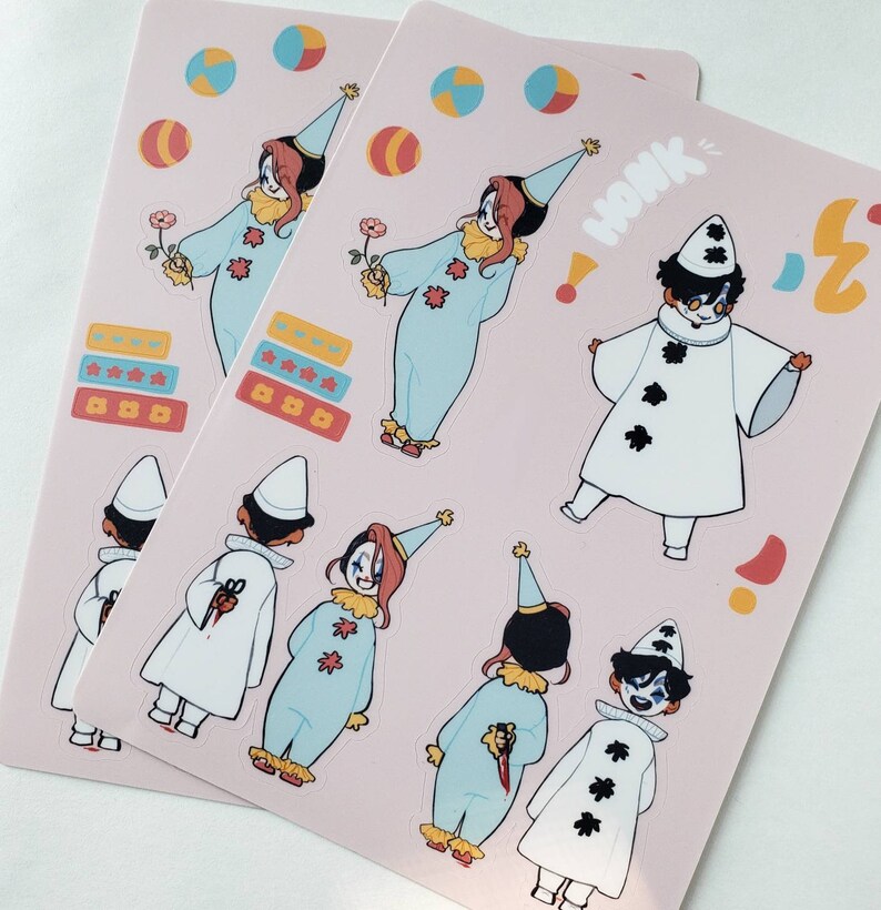 May include: A set of stickers featuring illustrations of clowns in various poses. The stickers are on a pink background with colorful polka dots and the word "Honk" written in black.