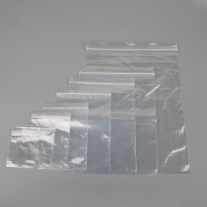 8 DIMENSIONI 100pcs Clear Self Adhesive Seal Sacchetti di plastica - Trasparente Richiudibile Cellophane PE Imballaggio Sacchetti di Polietilene