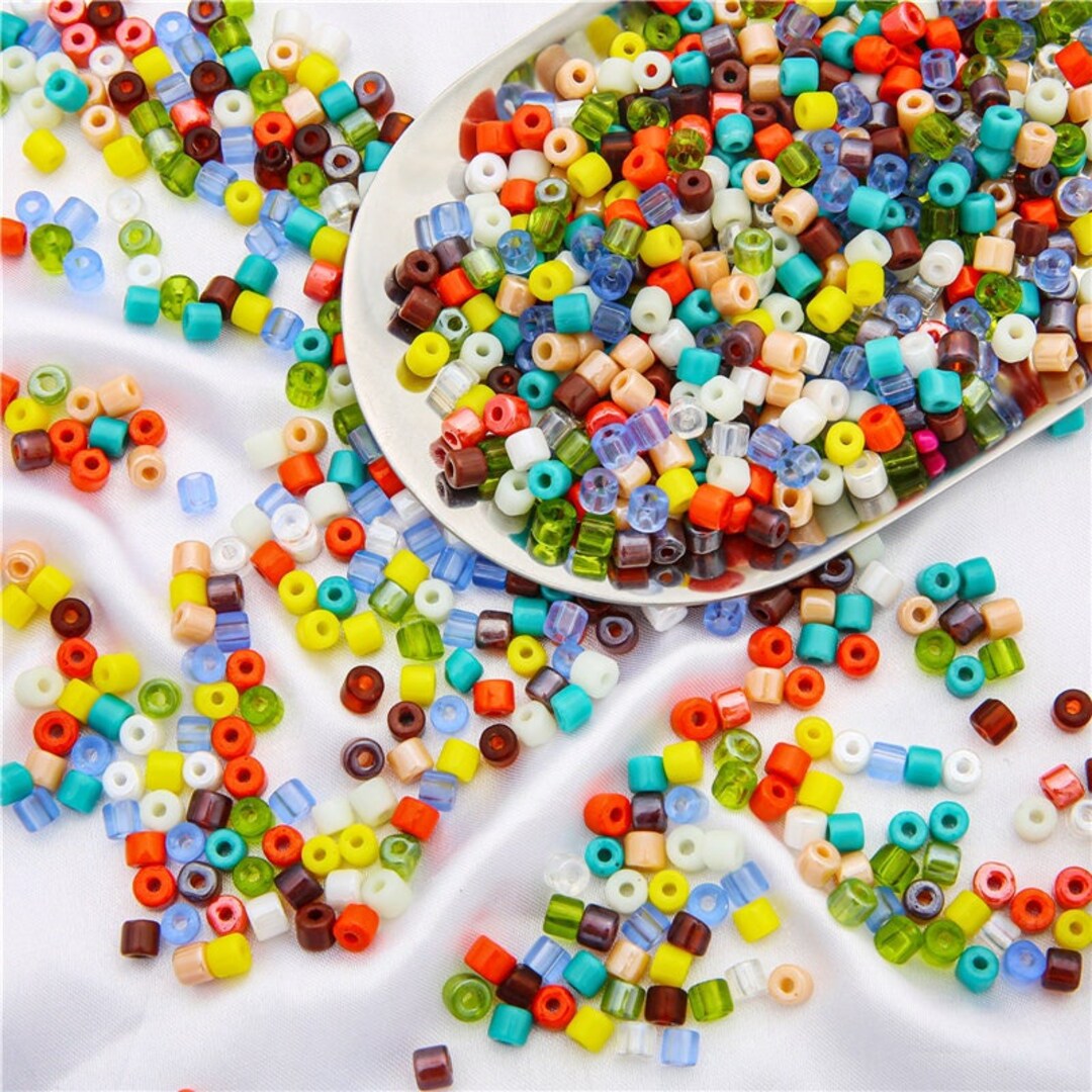 thumbnail image 2 of Bulk Lot 30 Cylinder 2mm Seed Beads – Full Rolls + Container + 30 Free Charms 2 of 5