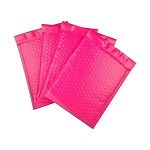 May include: A stack of bright pink bubble mailers. The mailers are made of a textured material with a bubble pattern. The edges are sealed, and the mailers are arranged in a slightly overlapping fan shape.