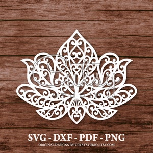 May include: White intricate cutout design of a stylized lotus flower with a decorative pattern. The design is on a brown wood background. SVG - DXF - PDF - PNG. Original designs by CutsyStudio.Etsy.com