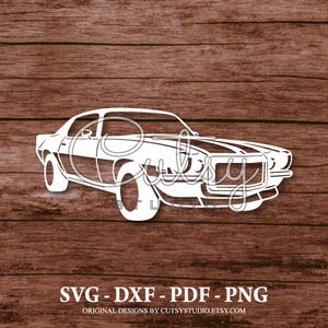 May include: White silhouette of a classic American muscle car with a black stripe across the hood. The car is set against a woodgrain background. SVG - DXF - PDF - PNG. Original designs by CutsyStudio.Etsy.com